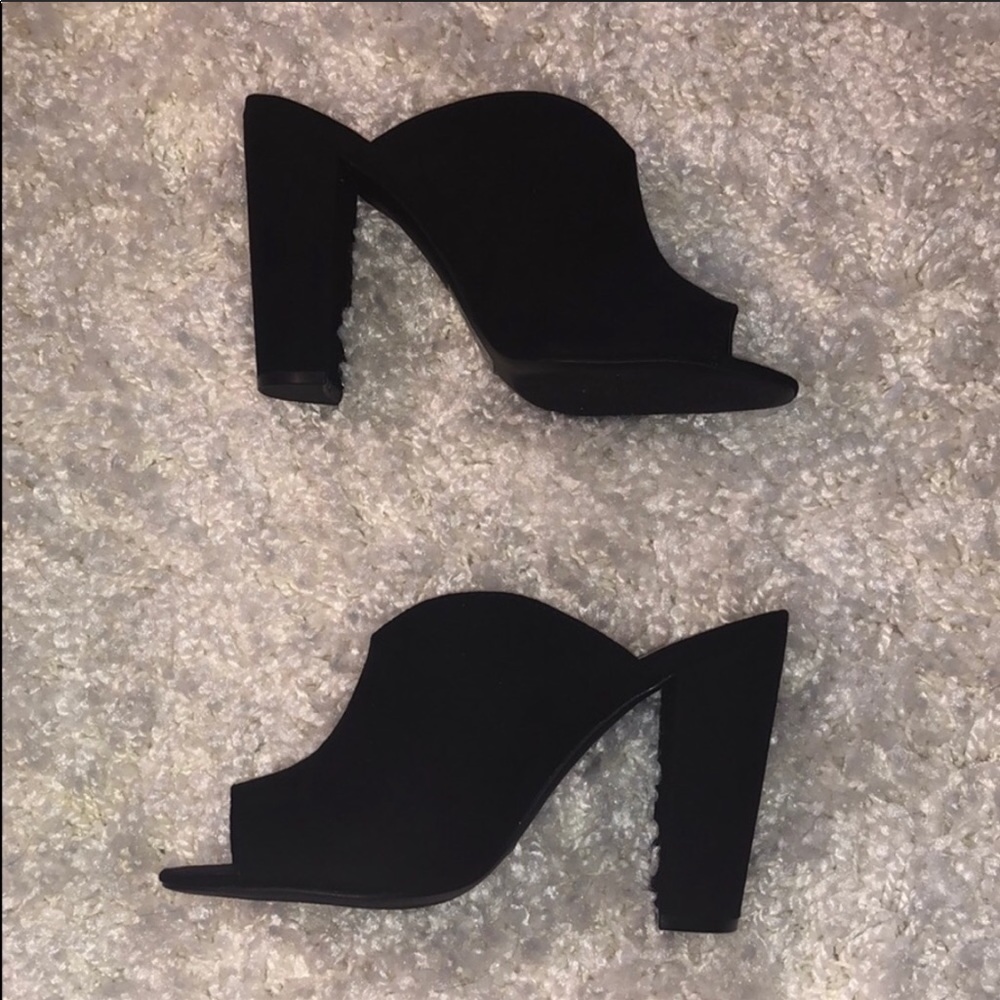 NWT Black Heeled Mules. Size 9.